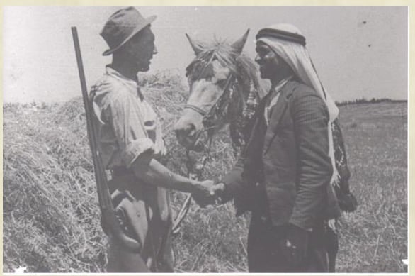 صورة لقرية غابات كفر صور - فلسطين: : صوره قديمه لاحد سكان القريه برفقه مستوطن من المستعمرات المجاوره