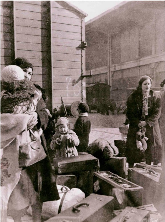 Jewish refugees waiting to receive_an official permit to leave on a steamship to Palestine, ca. 1935