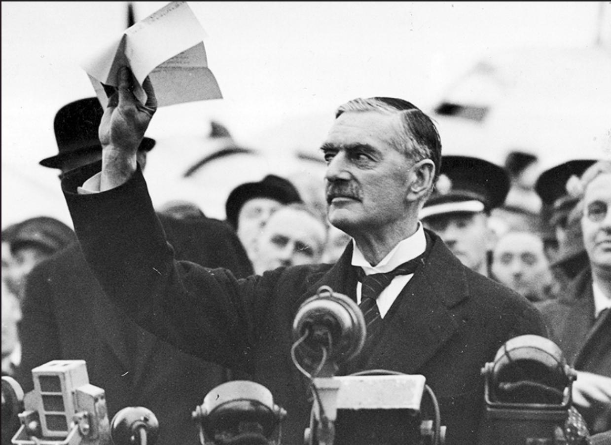 Chamberlain waving letter